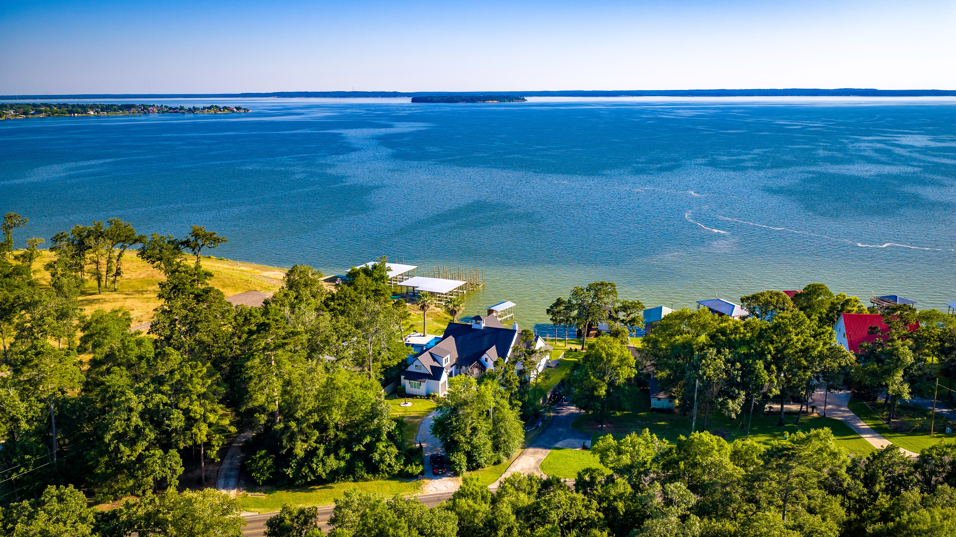 Aerial view of lake house from above