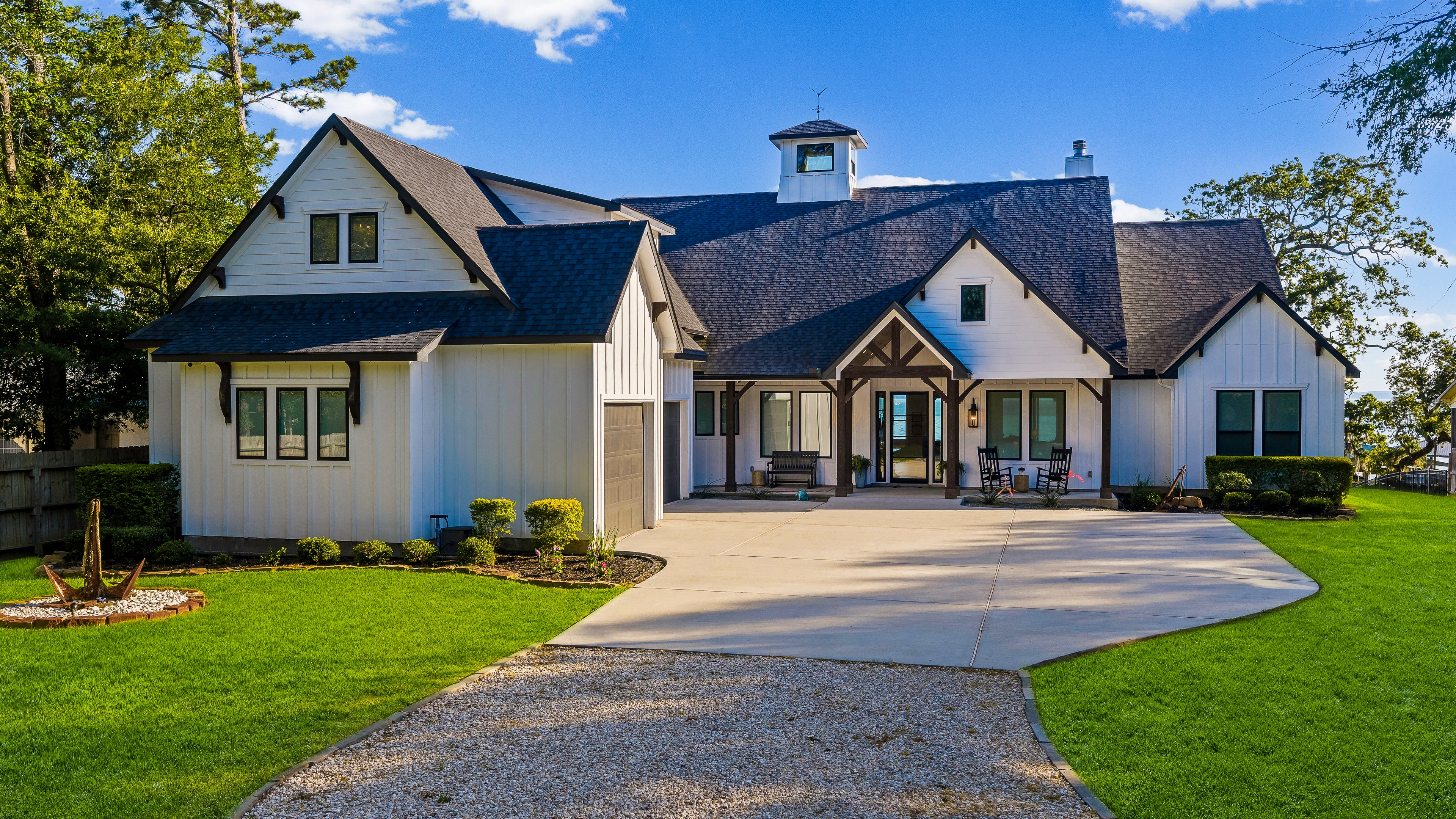 Livingston Lake House front exterior with manicured lawn