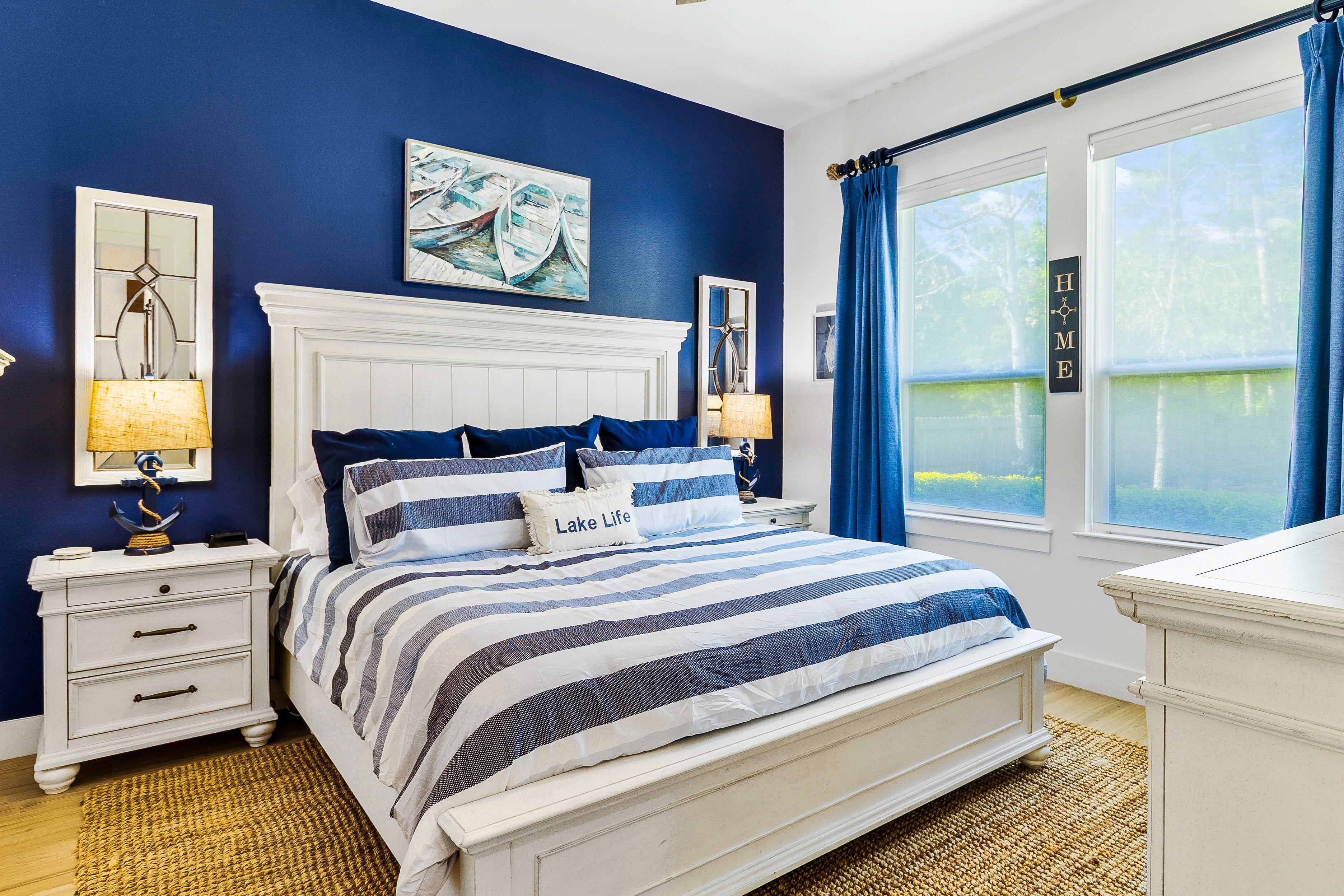 Coastal bedroom with blue striped bedding