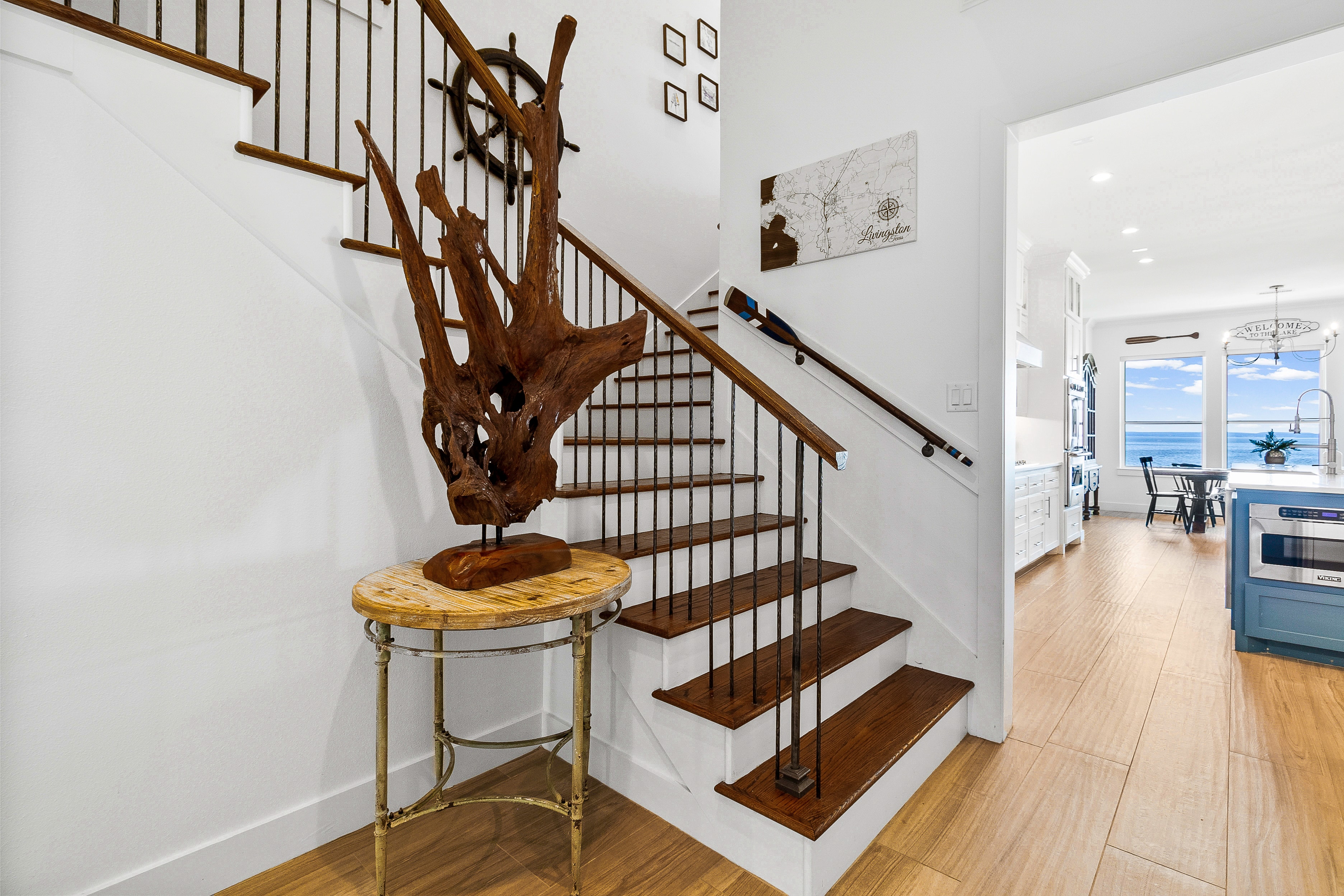 Driftwood sculpture on coastal home staircase