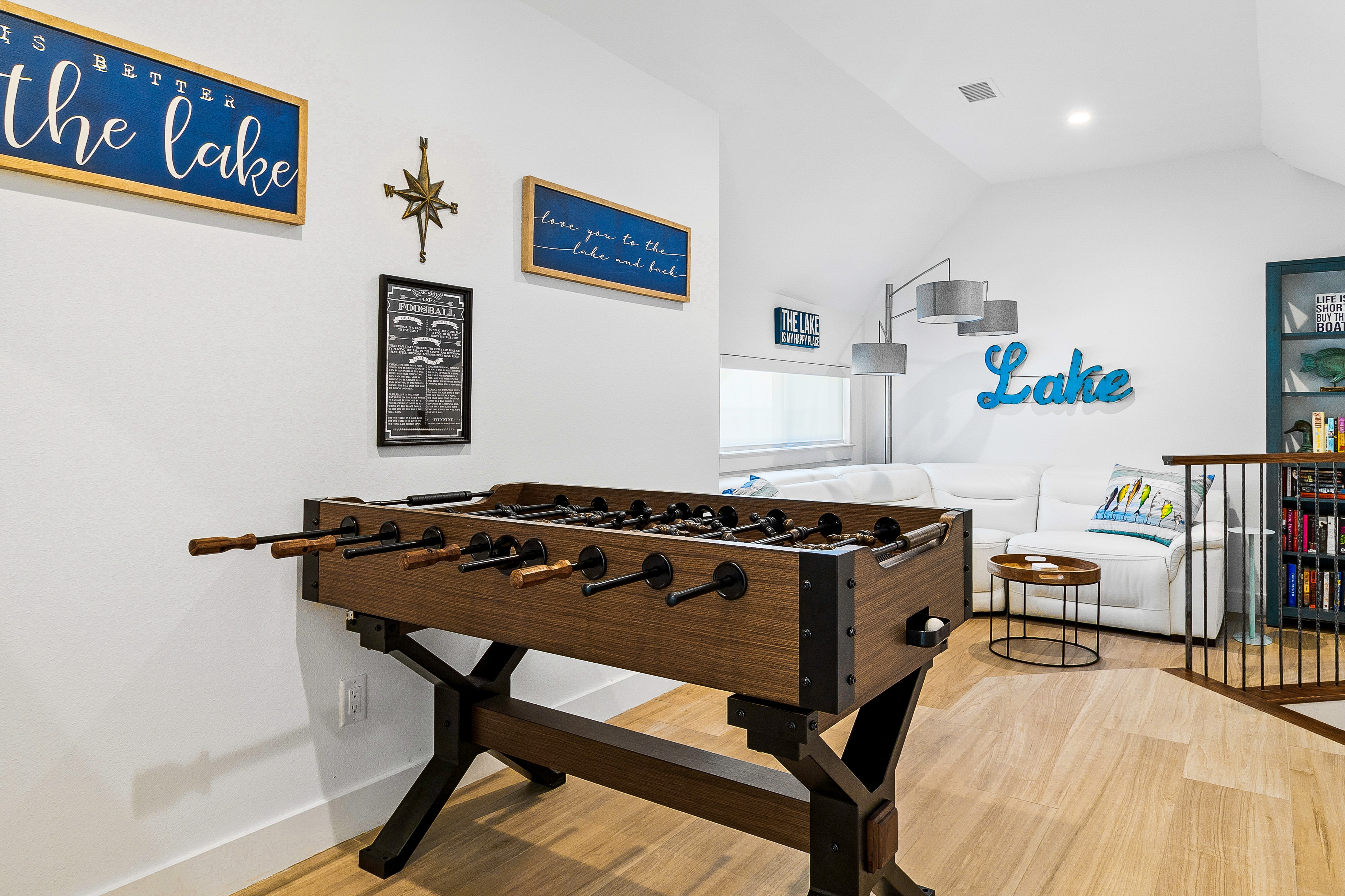Lake house recreation room with foosball table