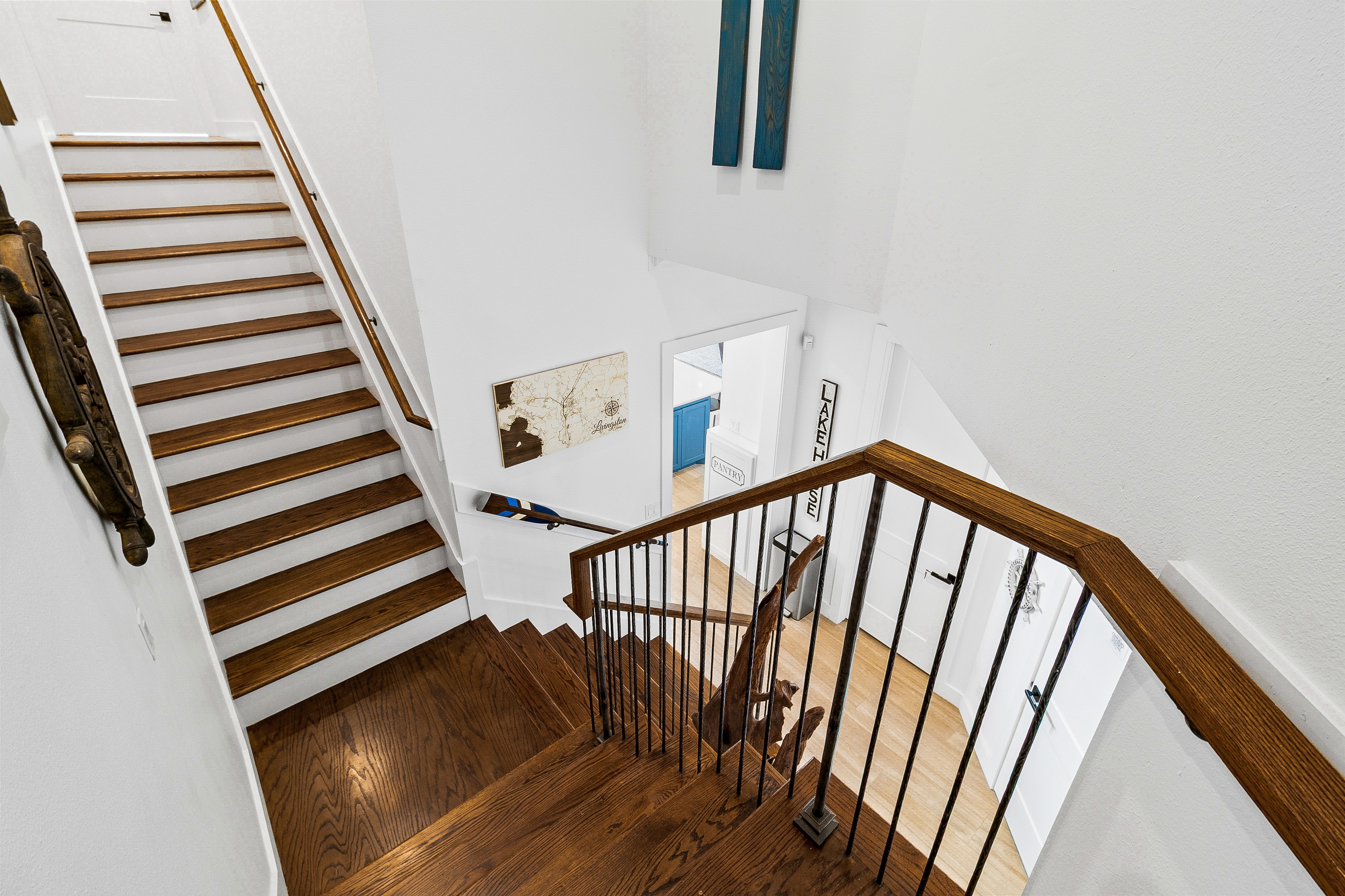 Modern stairwell with wooden steps and railing