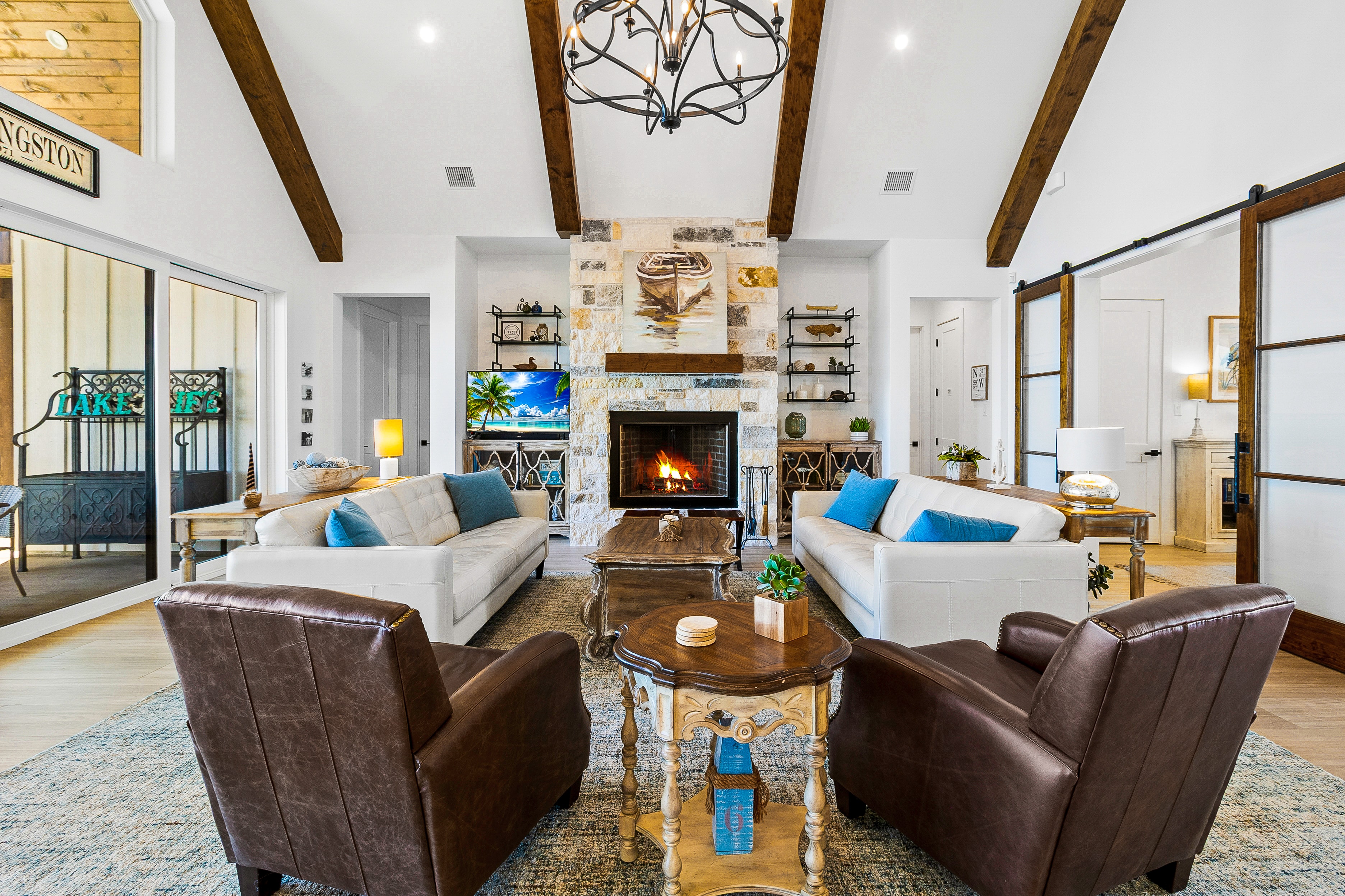 Living room with fireplace and exposed beams