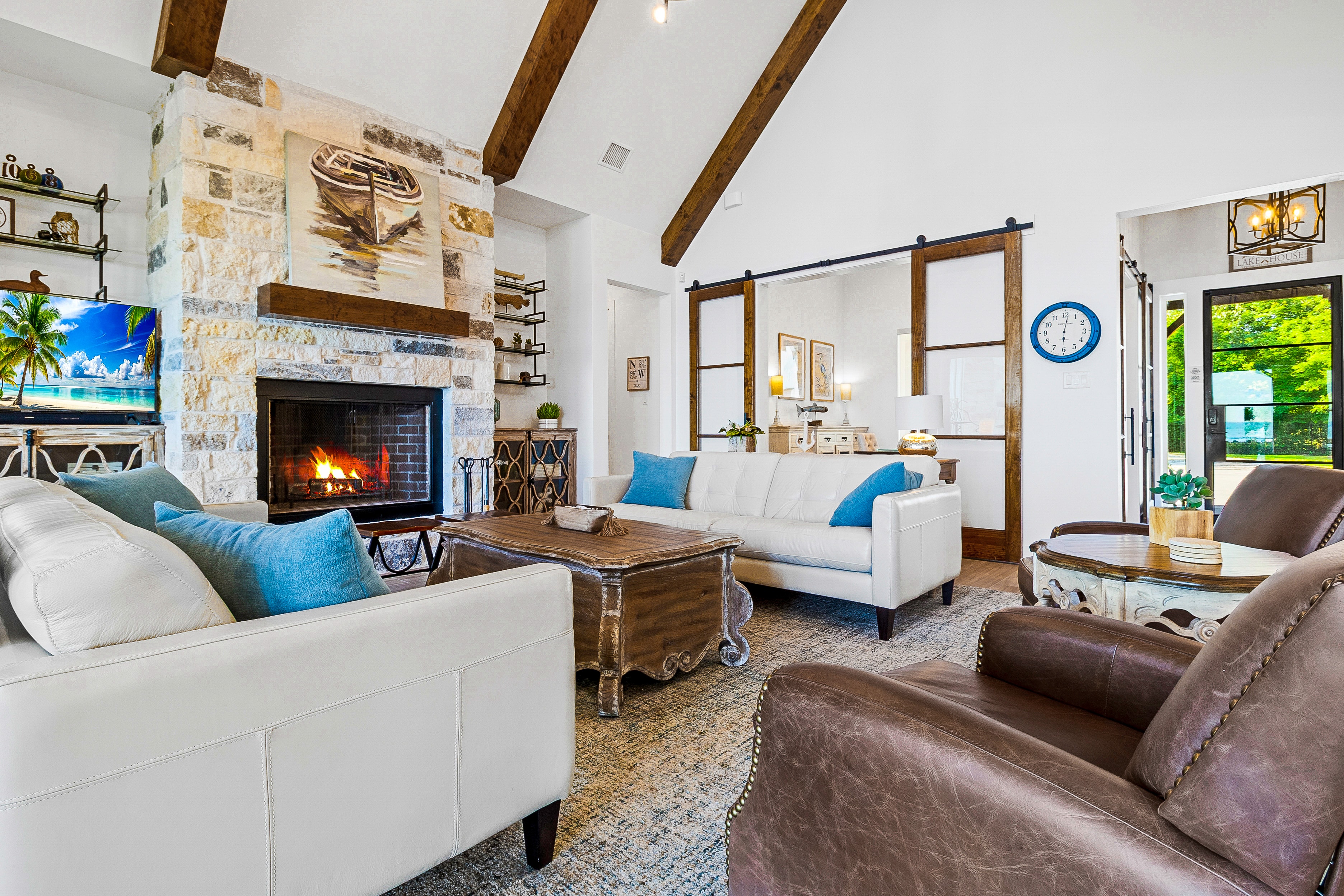 Modern living room with fireplace and exposed beams