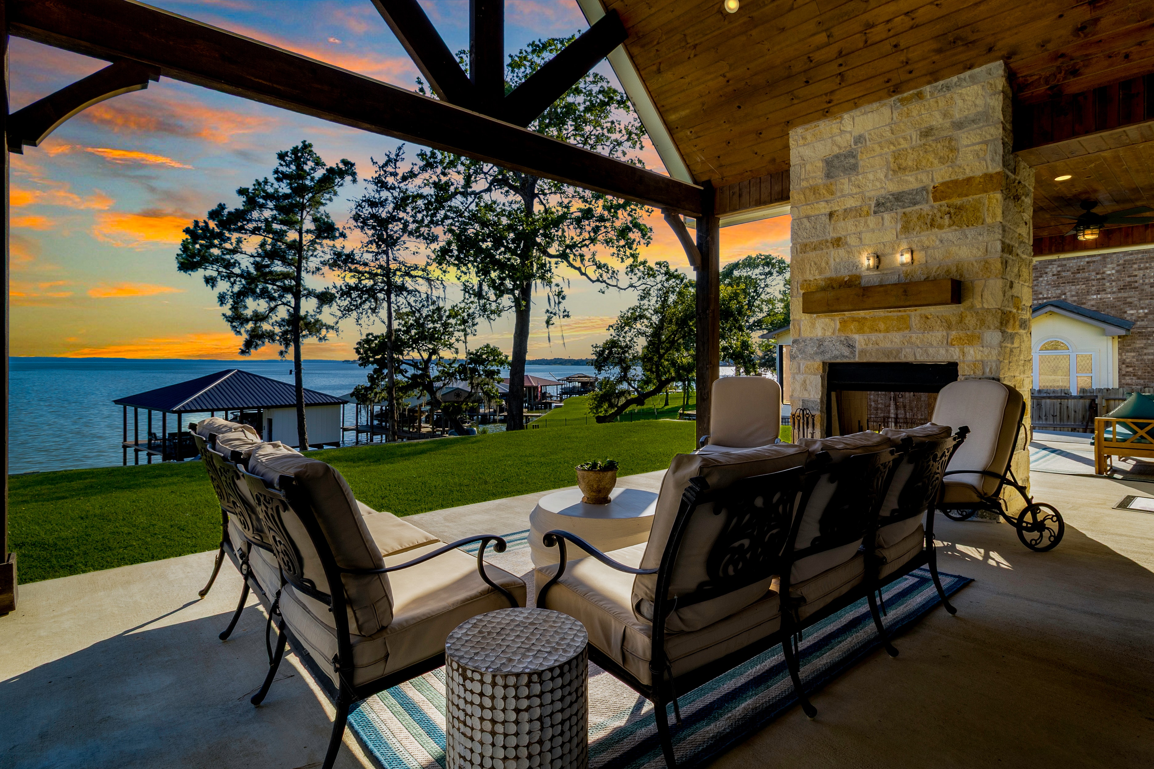 Lakefront patio at sunset