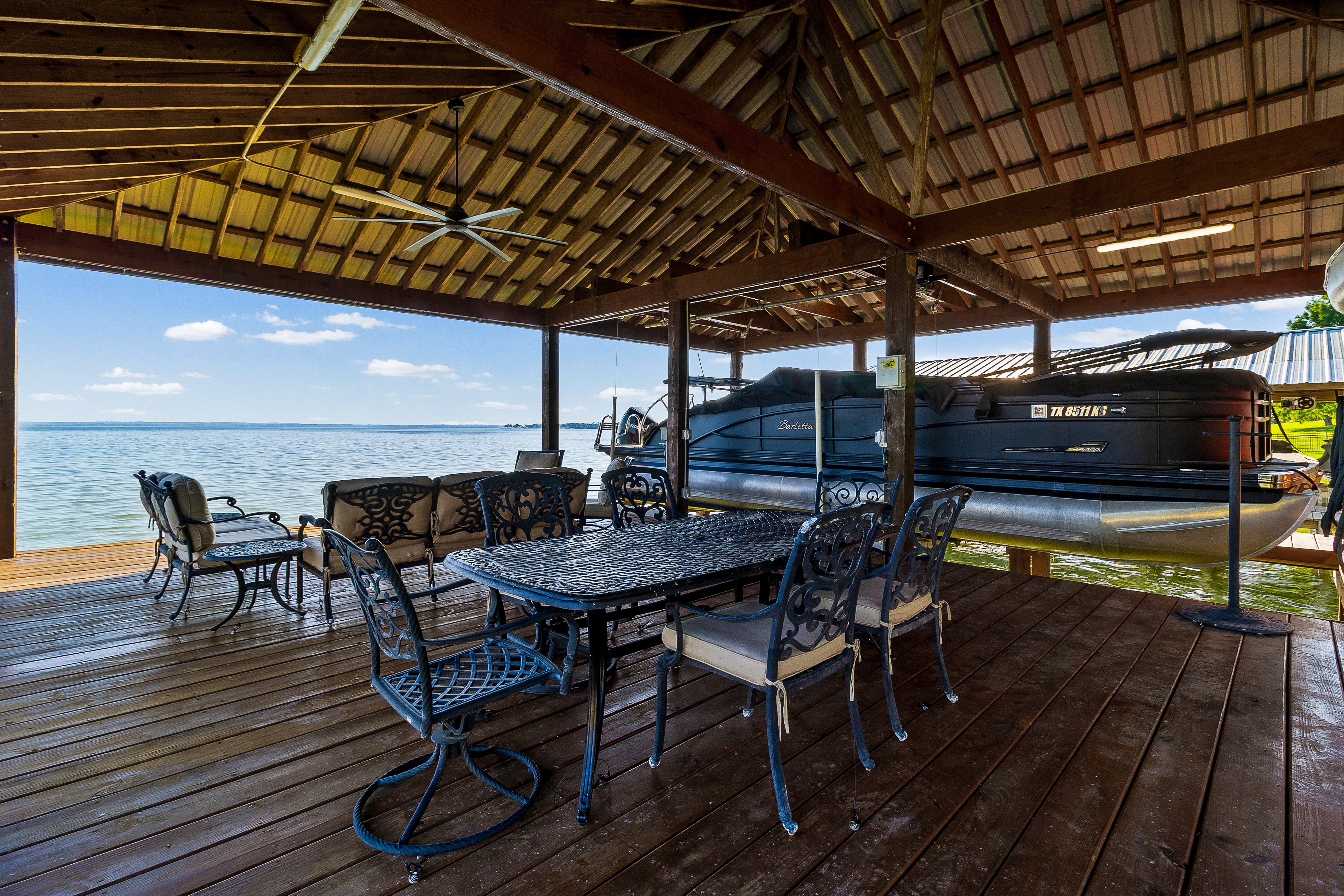 Waterfront dock pavilion with boats moored